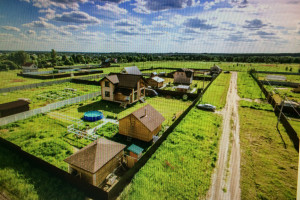 Фото — Дома из профбруса в коттеджном поселке — фото